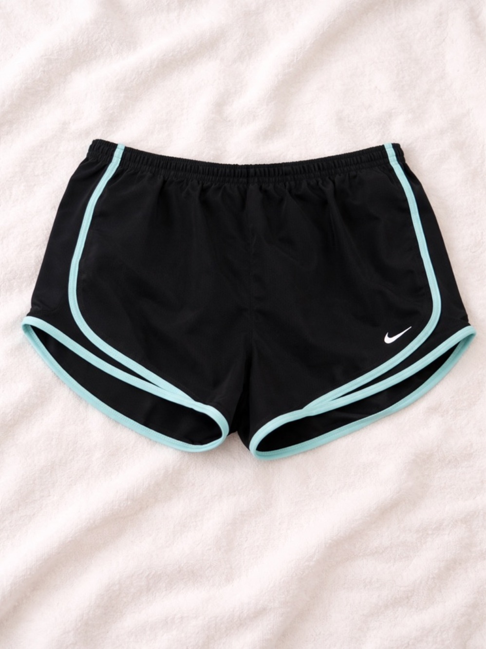 Nike Black and Blue Athletic Shorts with Curved Hem